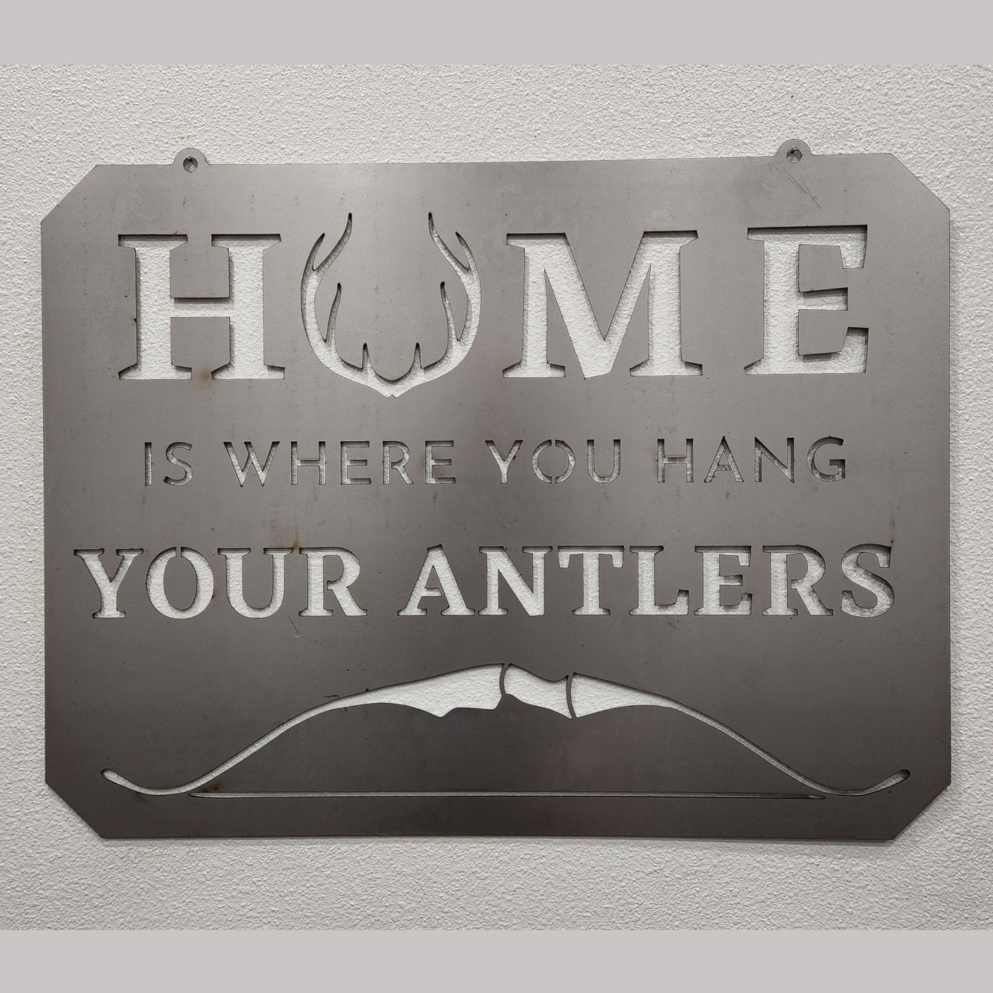 "Home Is Where You Hang Your Bow" Metal Hunting Wall Decor